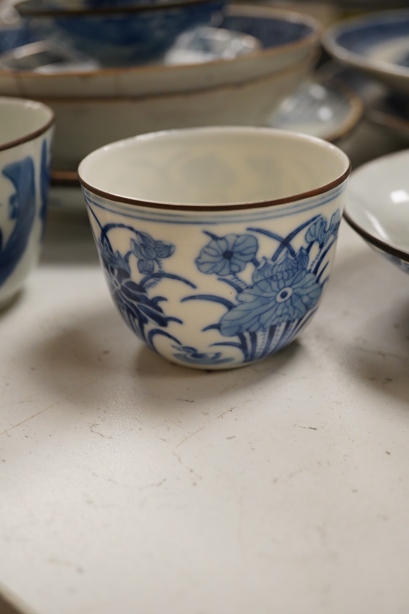 A group of assorted Chinese blue and white tableware. Largest 25cm. Condition - poor to fair